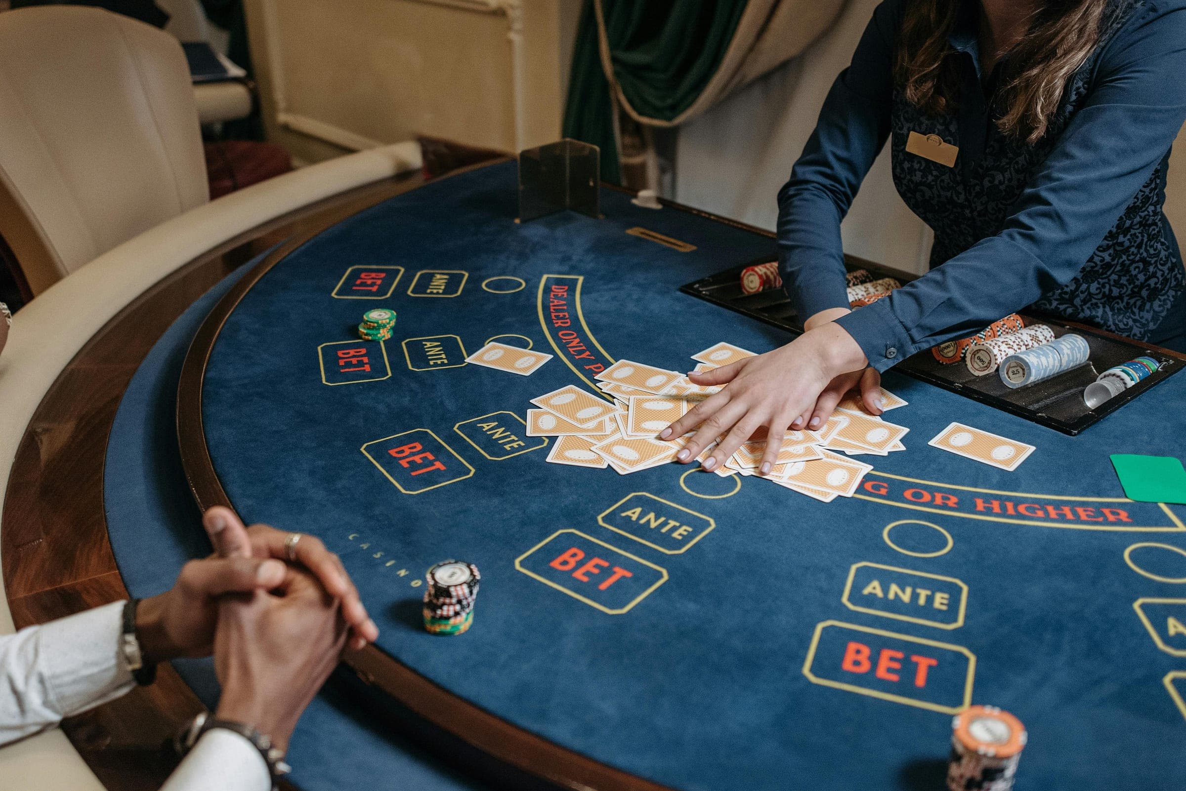 Chips and cards on a felt poker table